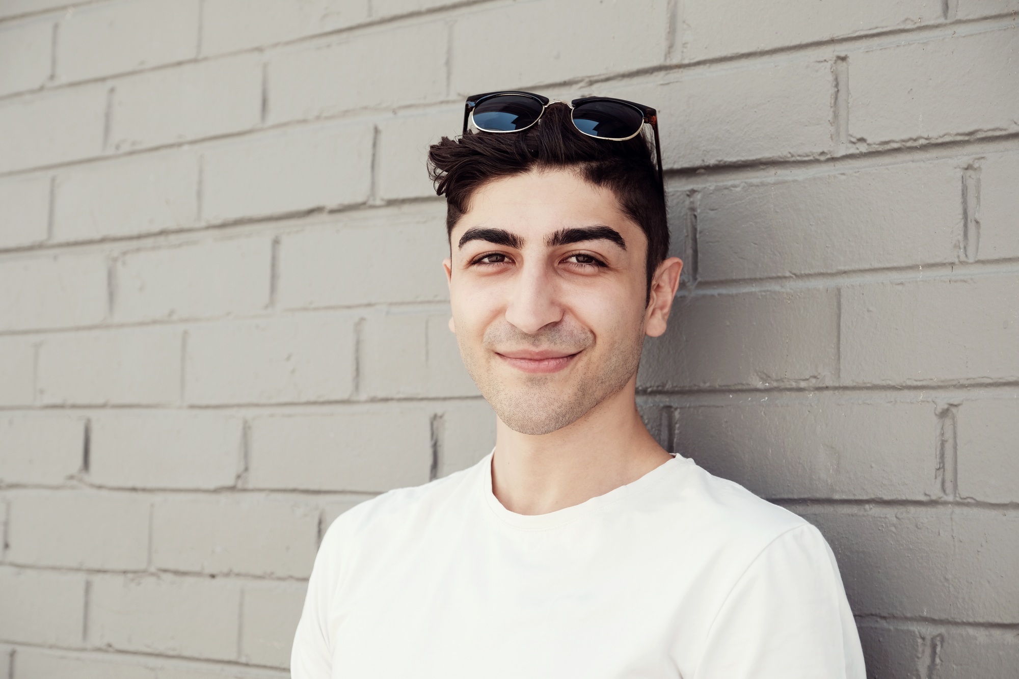 Happy multicultural young adult man portrait